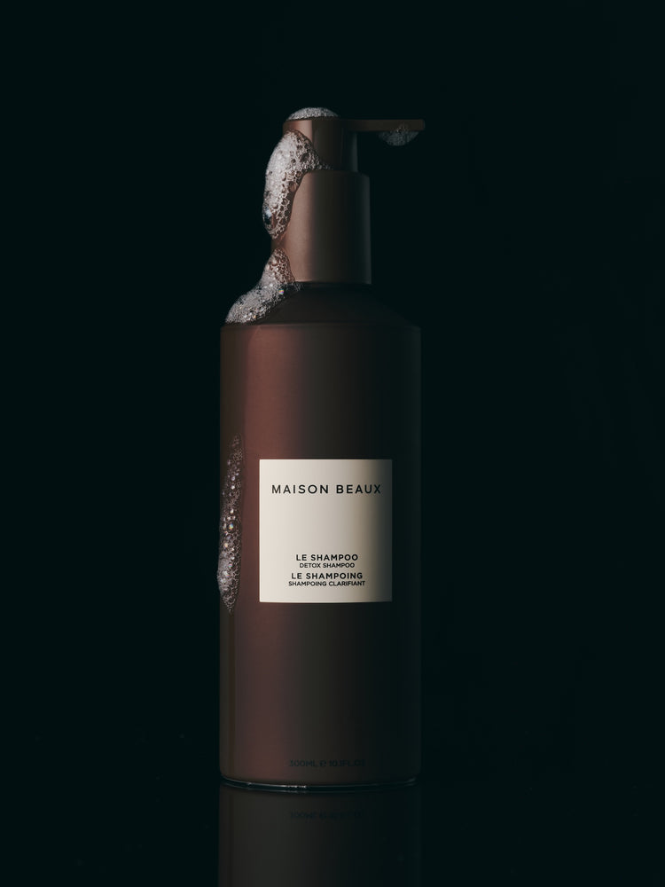 Le Shampoo 300 ML bottle with deep cleansing bubbles on it.