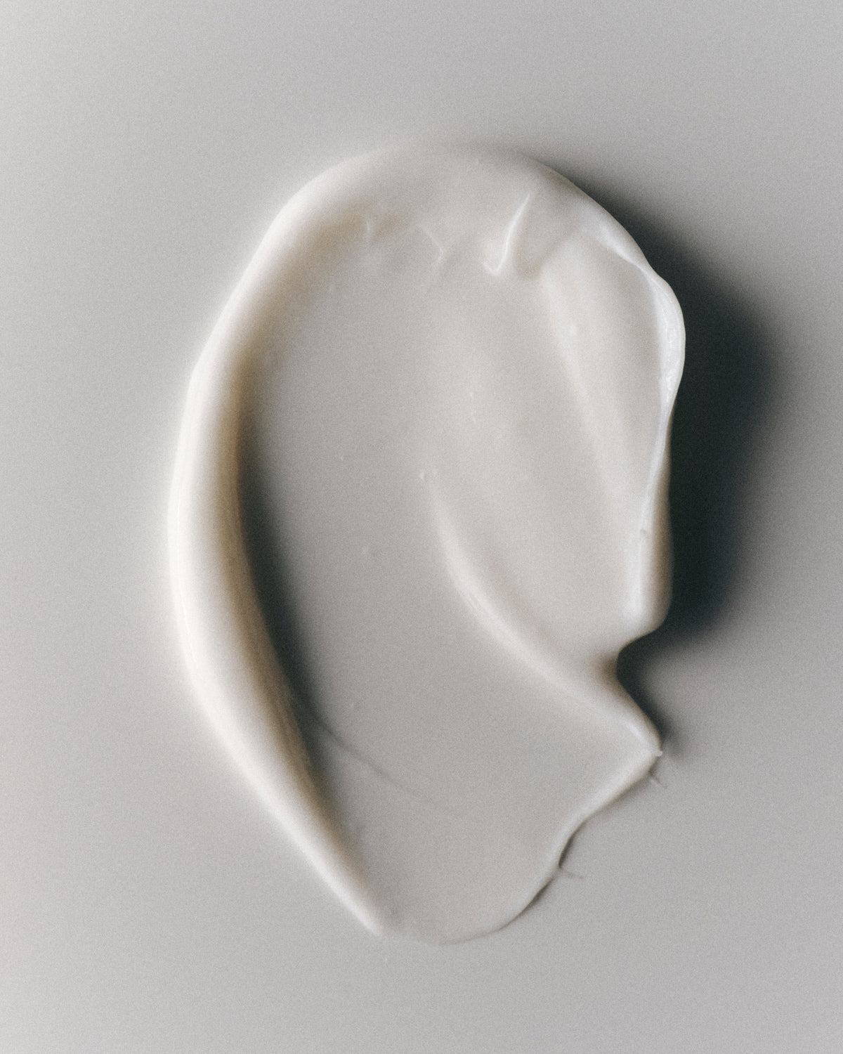 Le Styler creamy texture spread on white surface