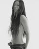 Black & white portrait video of a model with waist-length, straight and shiny dark hair